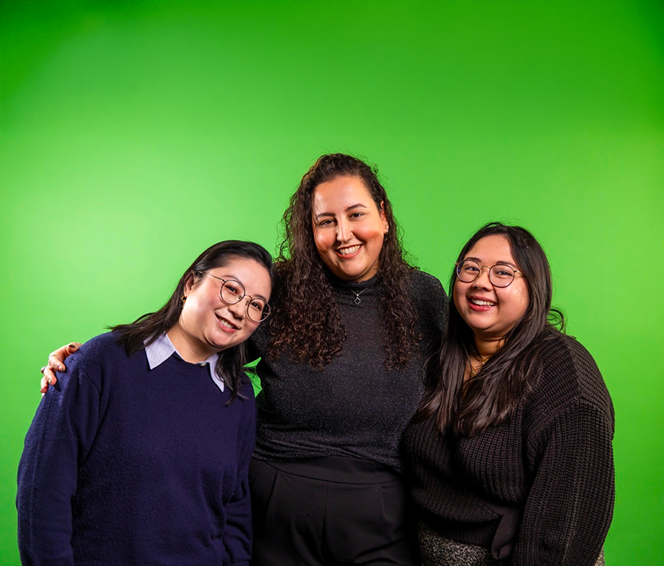 Smiling Staff photo on green